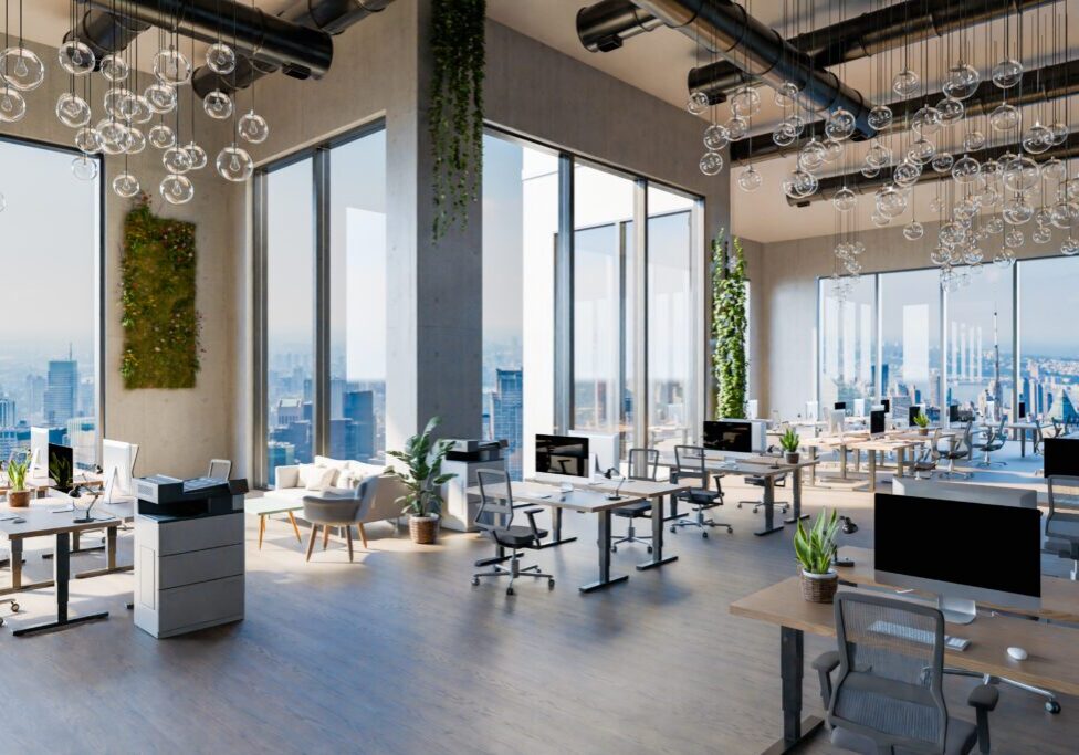 A large open office space with lots of windows.
